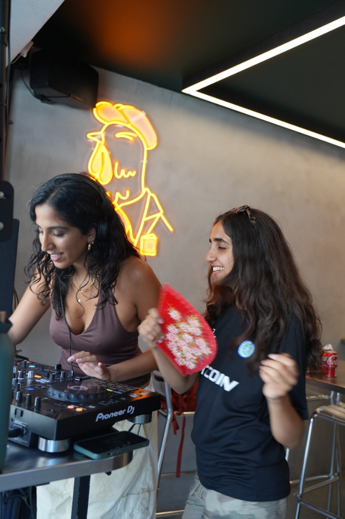 DJ Ruqs performing at the Fitcoin Run Club social